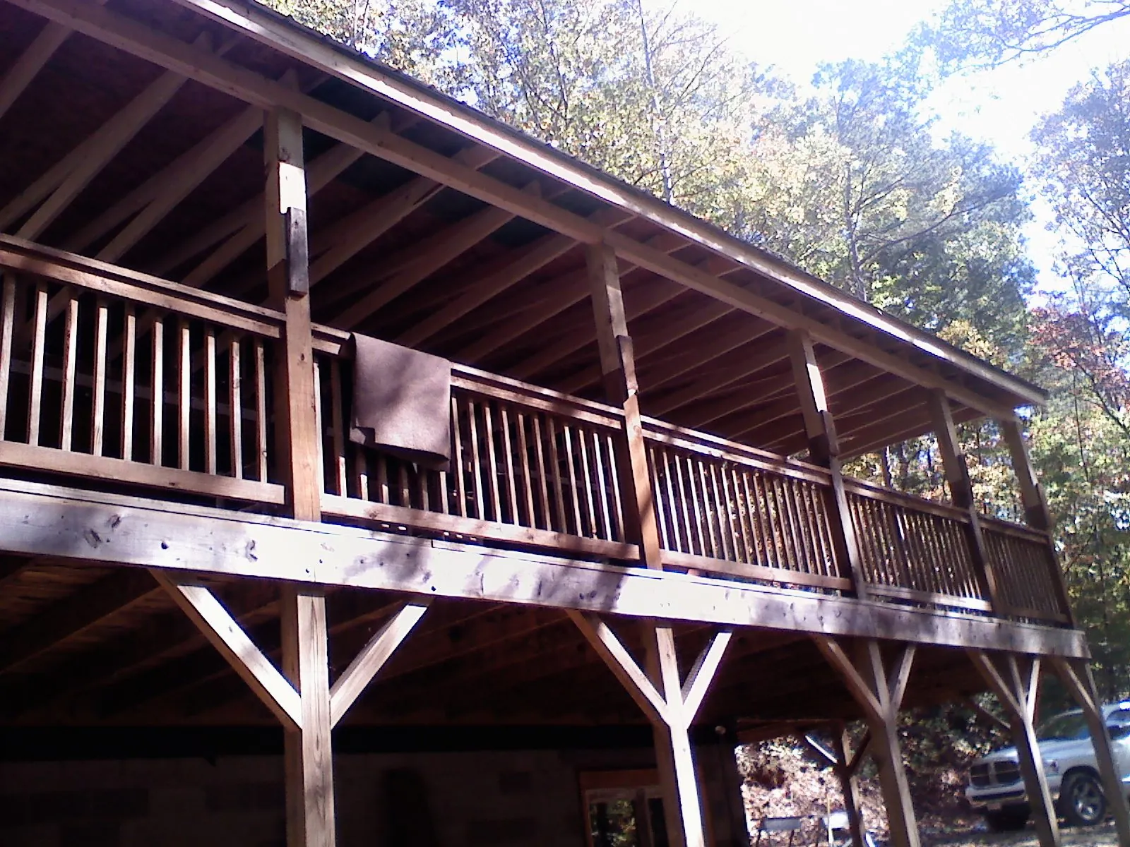 Timber framing under a new elevated porch and deck — Roof Leak Repair in Fort Washington by Roofing Brothers